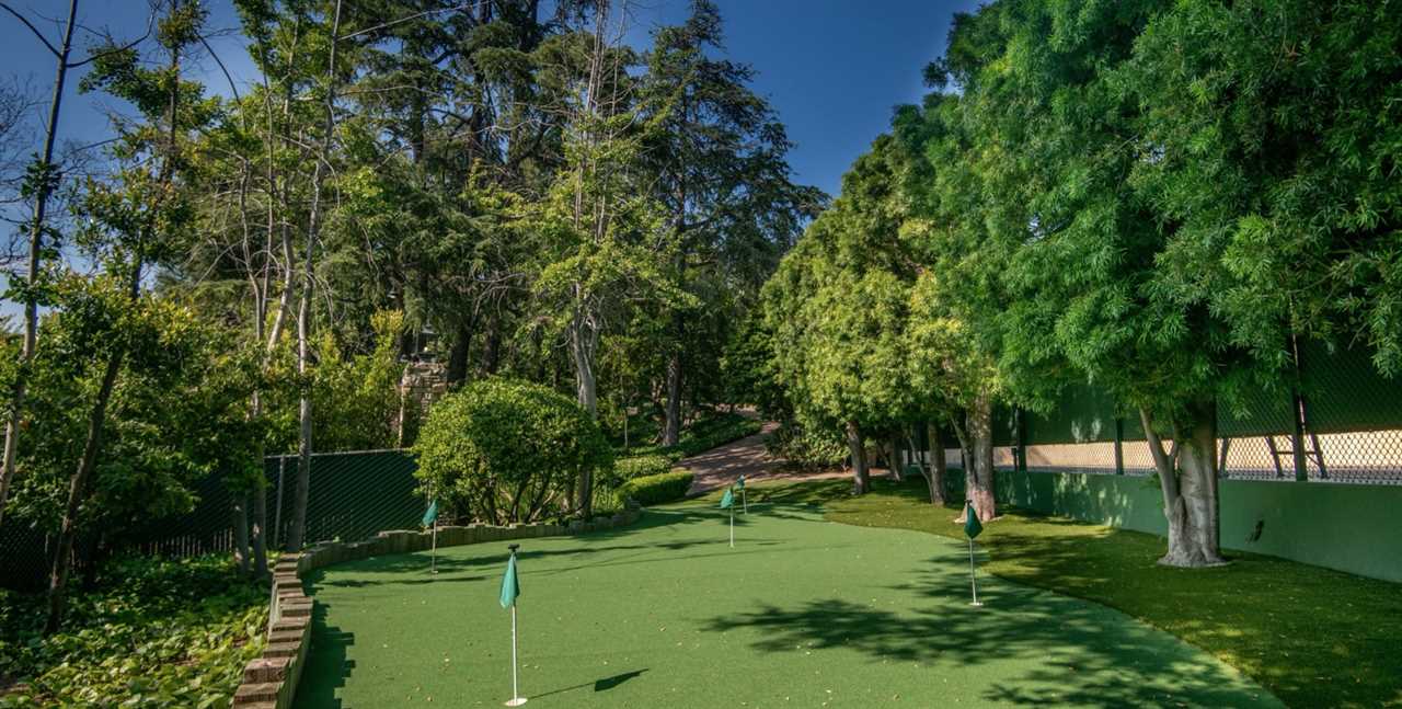 The property has its own putting green