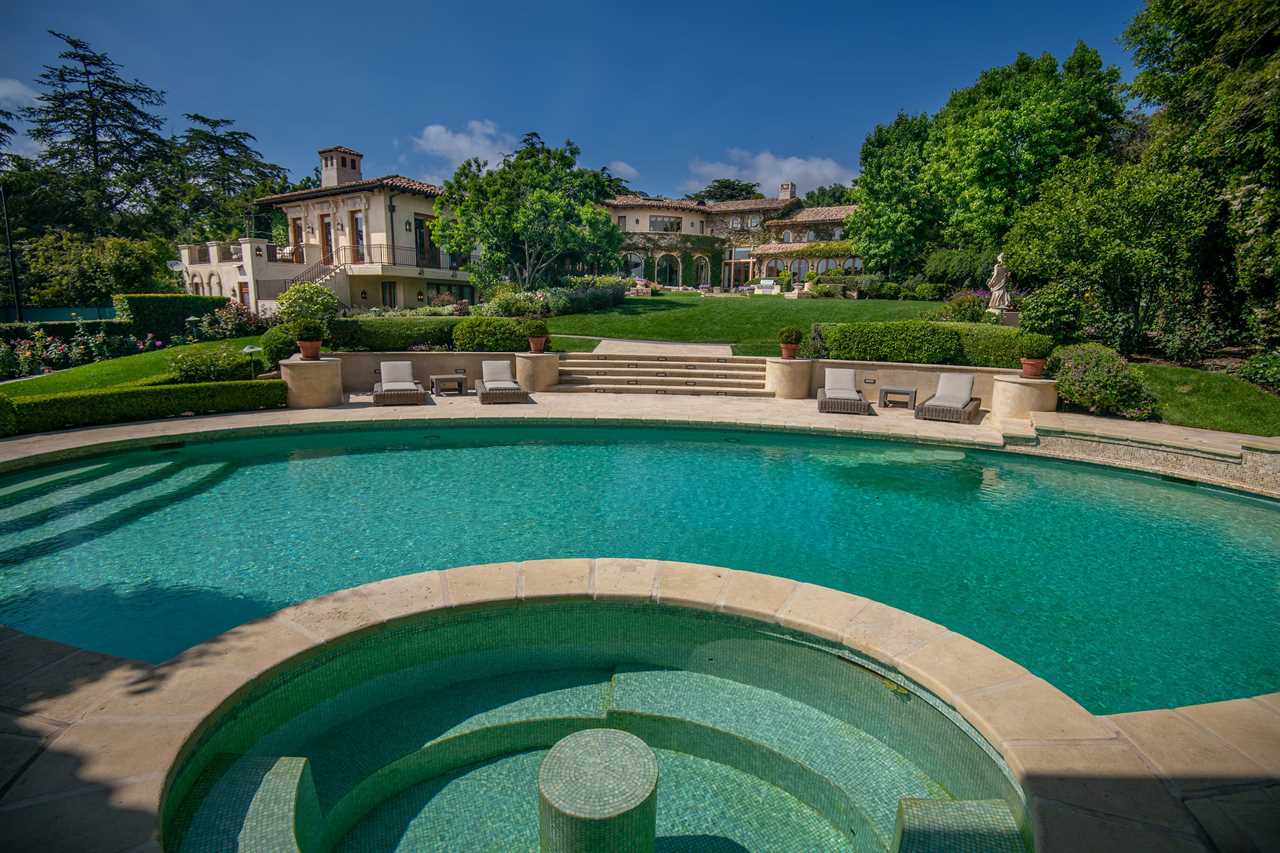 The property boasts a stunning sunken pool area