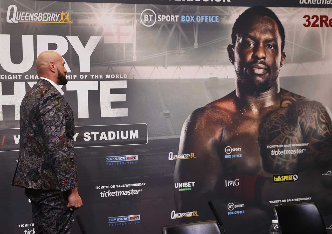 Watch as Tyson Fury looks down at Dillian Whyte's POSTER while his opponent misses presser