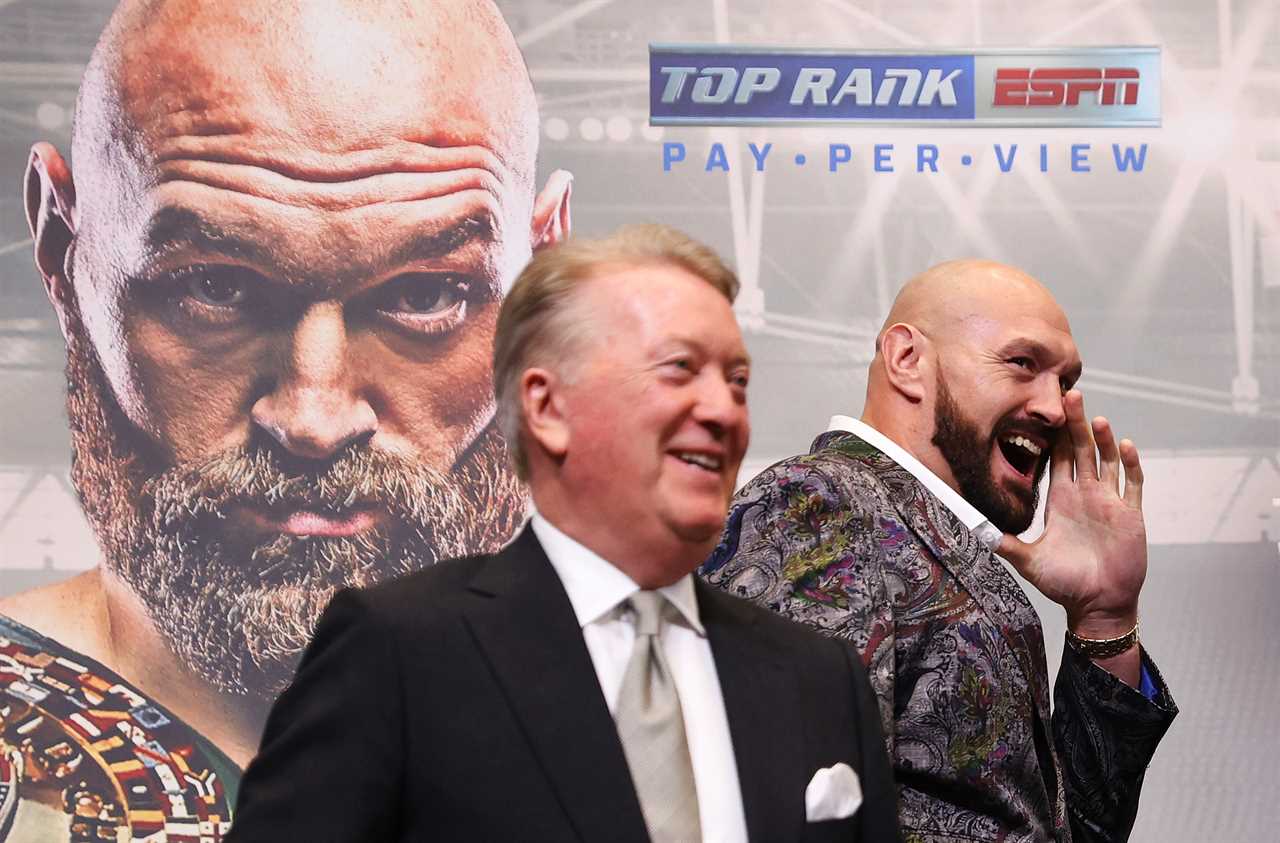 Watch as Tyson Fury looks down at Dillian Whyte's POSTER while his opponent misses presser