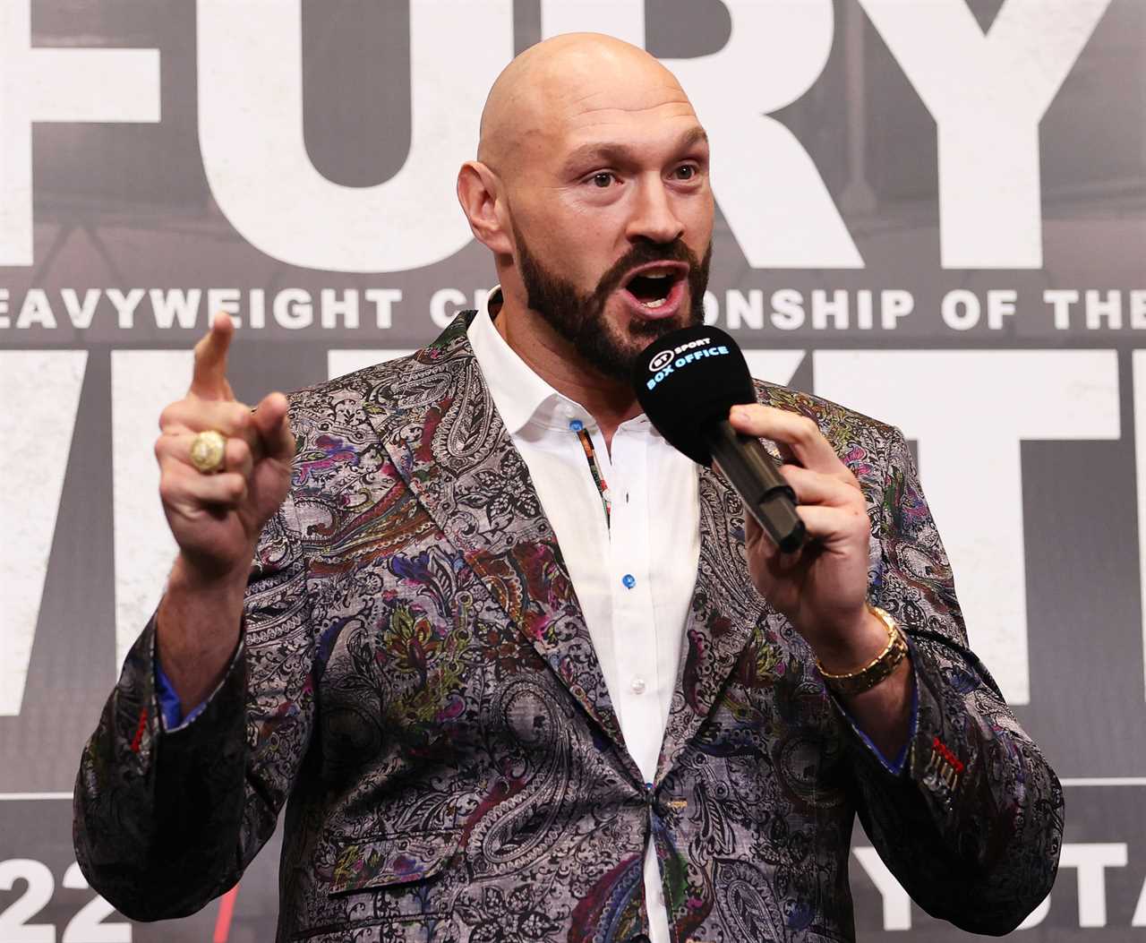 Watch as Tyson Fury looks down at Dillian Whyte's POSTER while his opponent misses presser