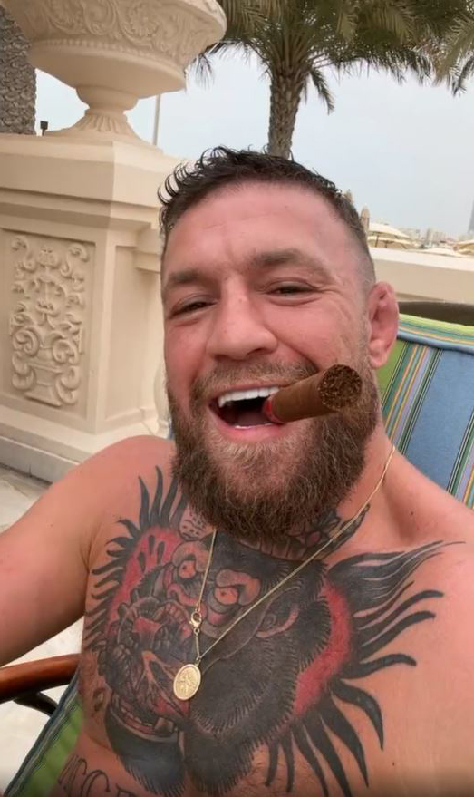 Conor McGregor's bizarre, three-second clip in which he laughs topless while smoking an unlit cigar is a puzzlement for fans