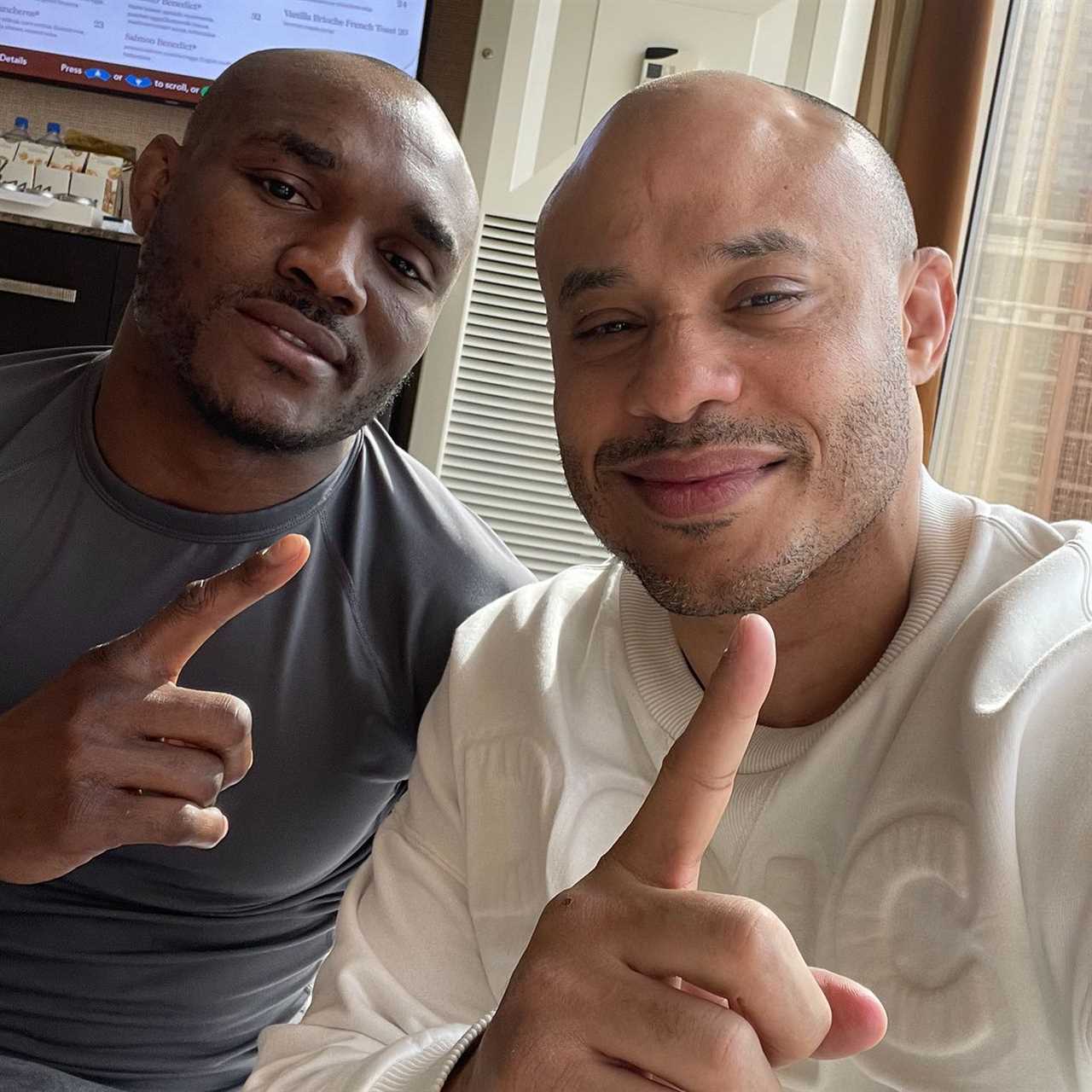 Kamaru Usman's manager called Canelo alvarez a COWARD and predicted that the UFC champ would KO boxing star in just three rounds