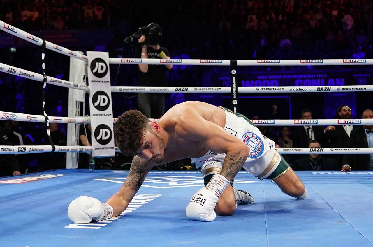 Leigh Wood defeats Michael Conlan, but an Irishman is taken to the hospital straight after falling through the ropes at grim KO