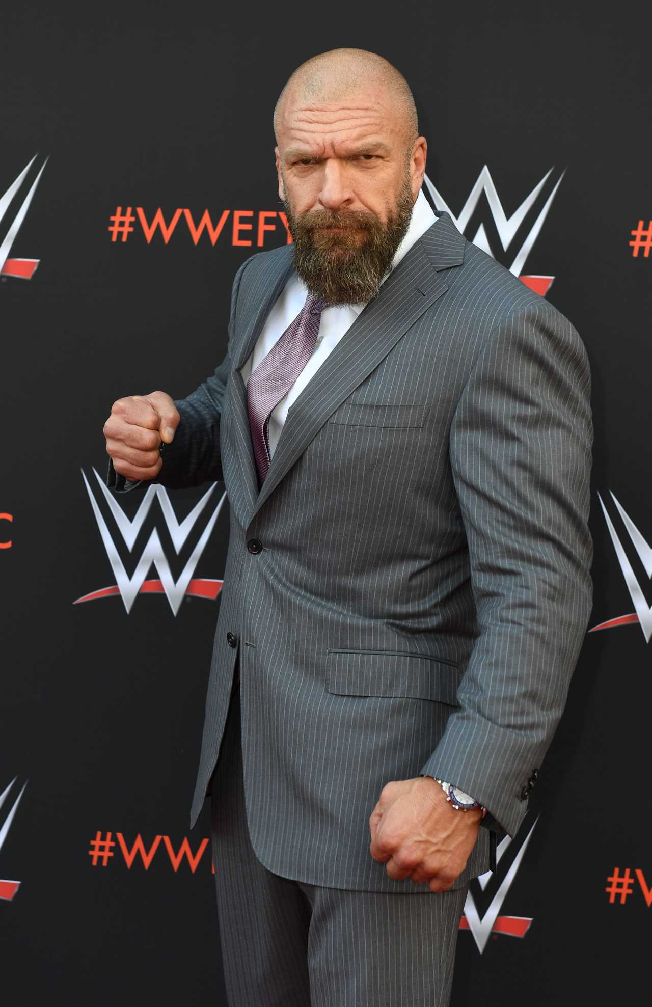 Triple H, 52-year-old WWE legend, says he will not wrestle again after having a defibrillator placed in his chest following surgery