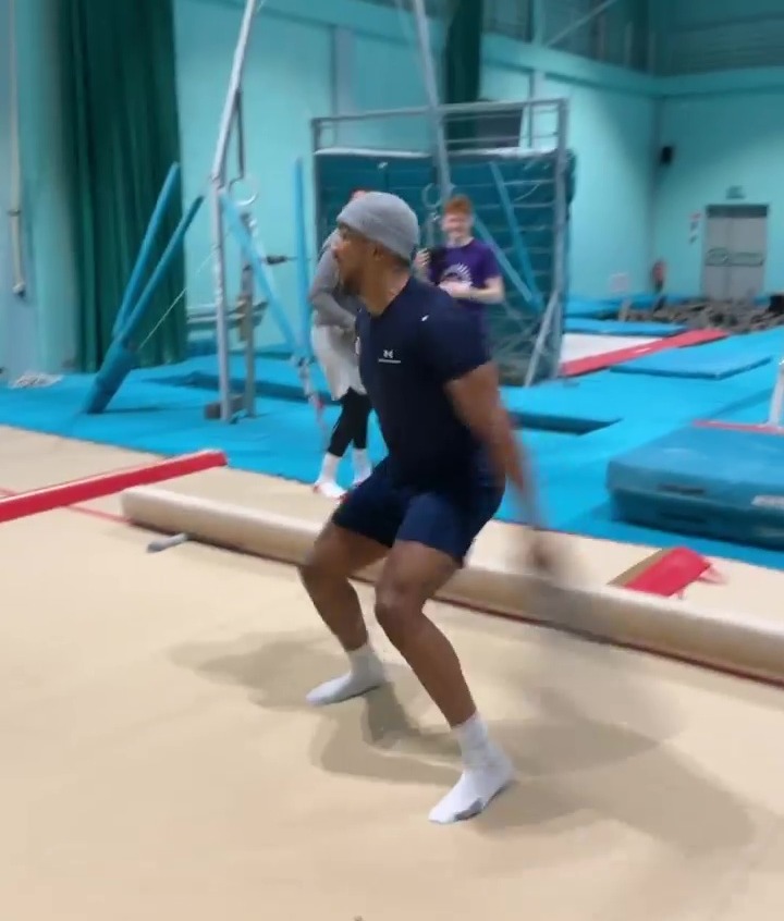 After knocking his team-mate off the balance beam, Anthony Joshua nails Cristiano Ronaldo's Siu celebration.