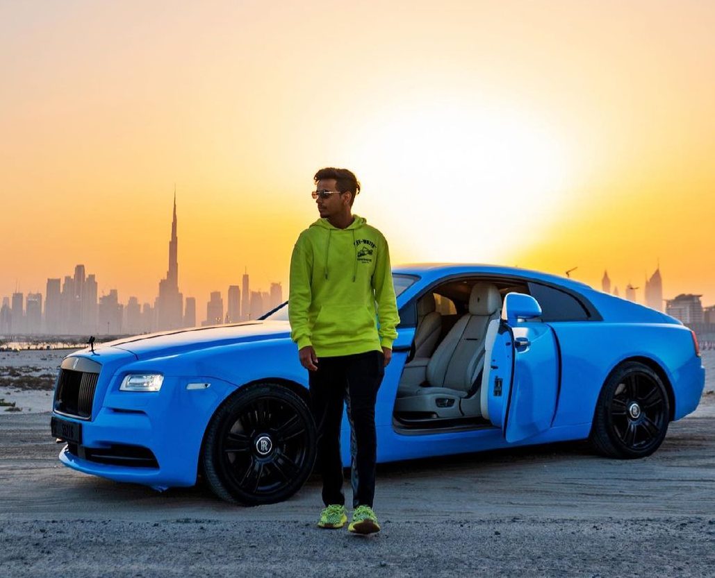 Wealthy Money Kicks shows off his wheels