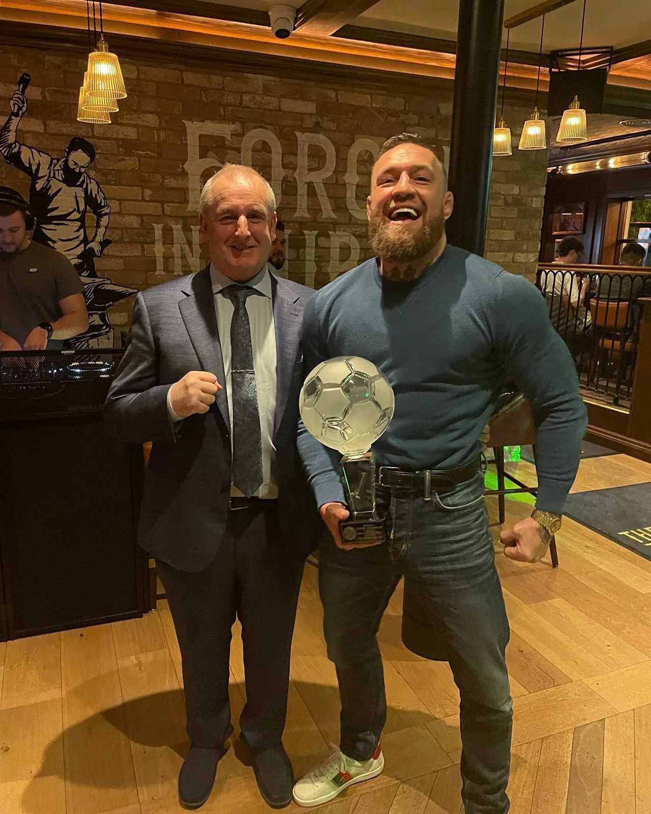 Conor McGregor presents his Black Forge Inn luxury ROLEX watch to Conor McGregor as the best boss in the world.