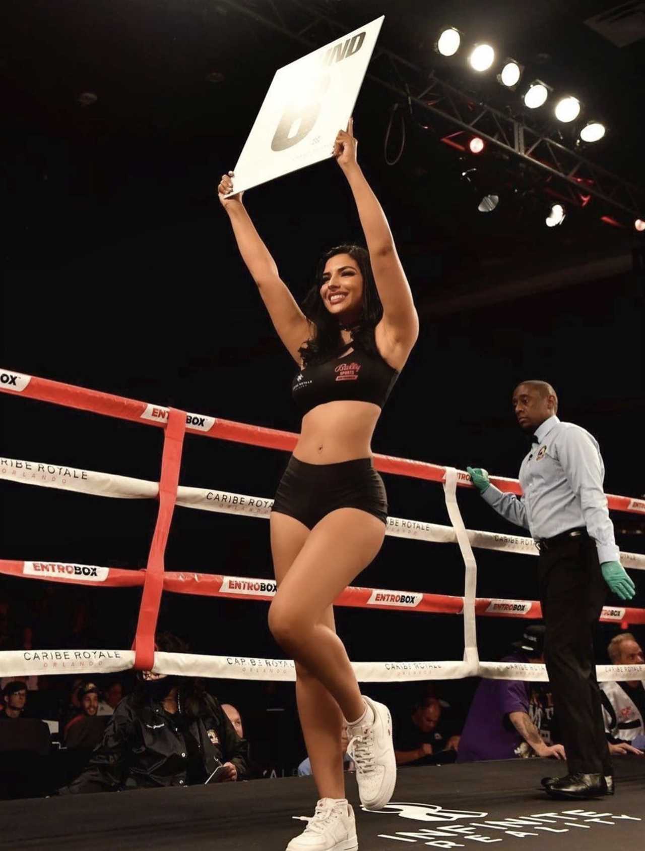 A stunning boxing ring girl calls Vladimir Putin, the Russian president, for a fight. She vows to be aggressive.
