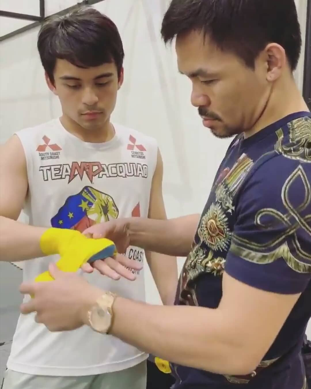 Manny Pacquiao's father Jimuel spoke to Alex Wassabi during a charity exhibition, until Jake Paul signed YouTube star.