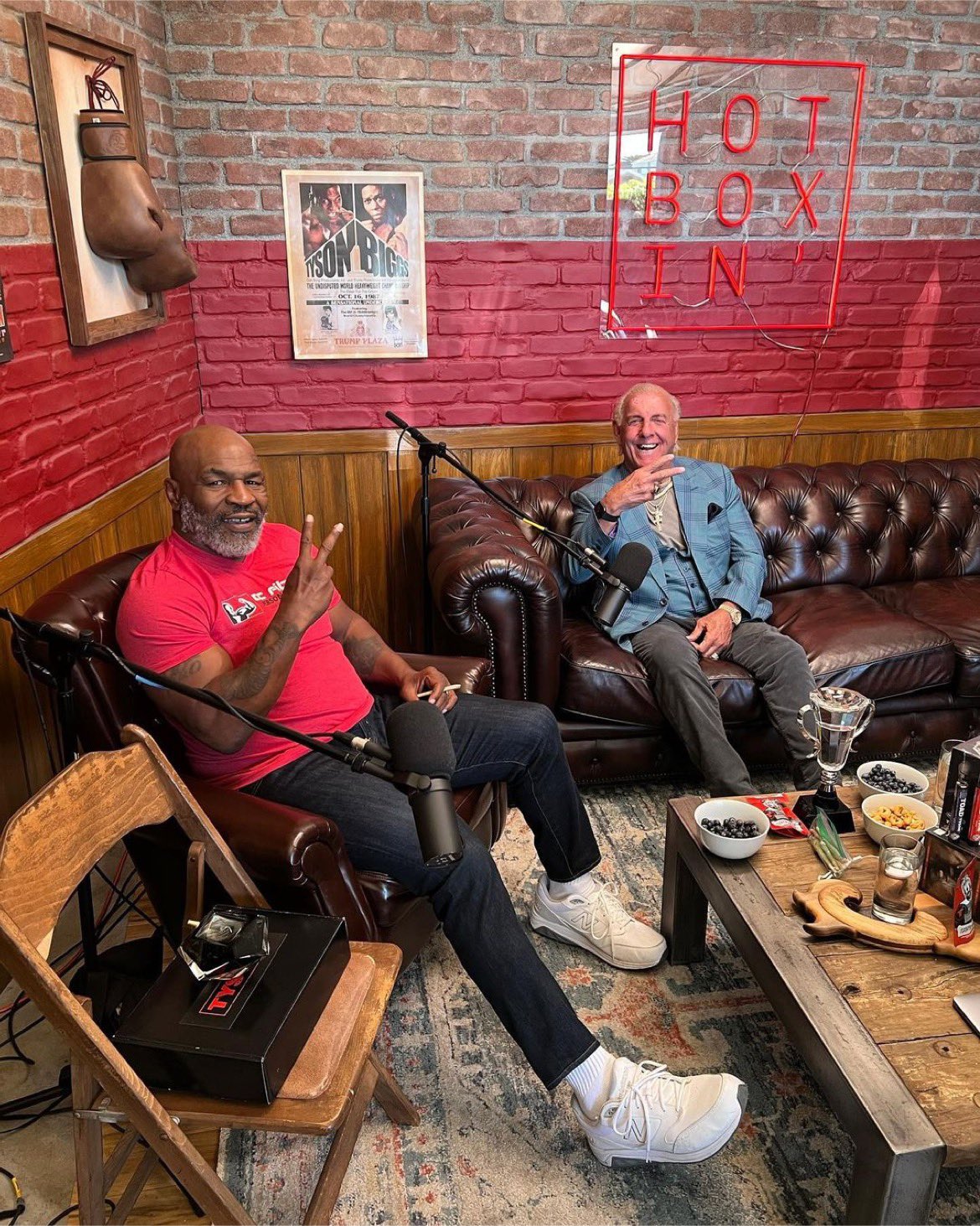 Ric Flair told Mike Tyson that he believes the Will Smith-Chris Rock bust was FAKE.