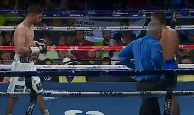 After being knocked out by a brutal punch from a fighter, he is taken to the ring.