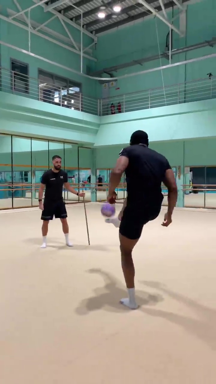 Anthony Joshua, a heavyweight star, shows off his football skills.