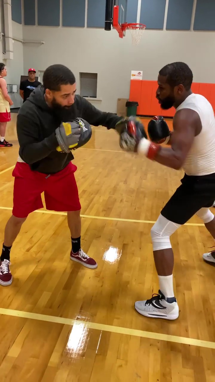 Floyd Mayweather, 45, shows off his incredible hand speed as he prepares to box against Don Moore