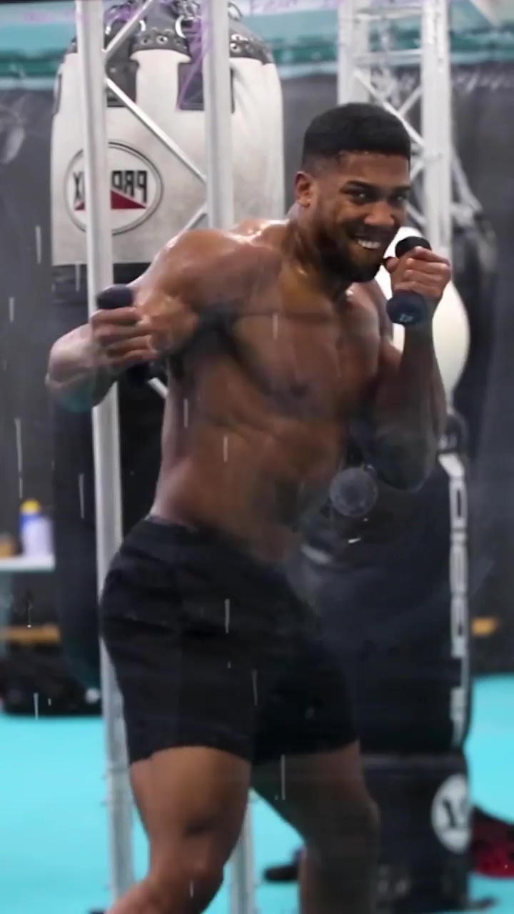 Watch Anthony Joshua train, as he displays a ripped body and terrifying punch power in preparation for Oleksandr Usyk's rematch