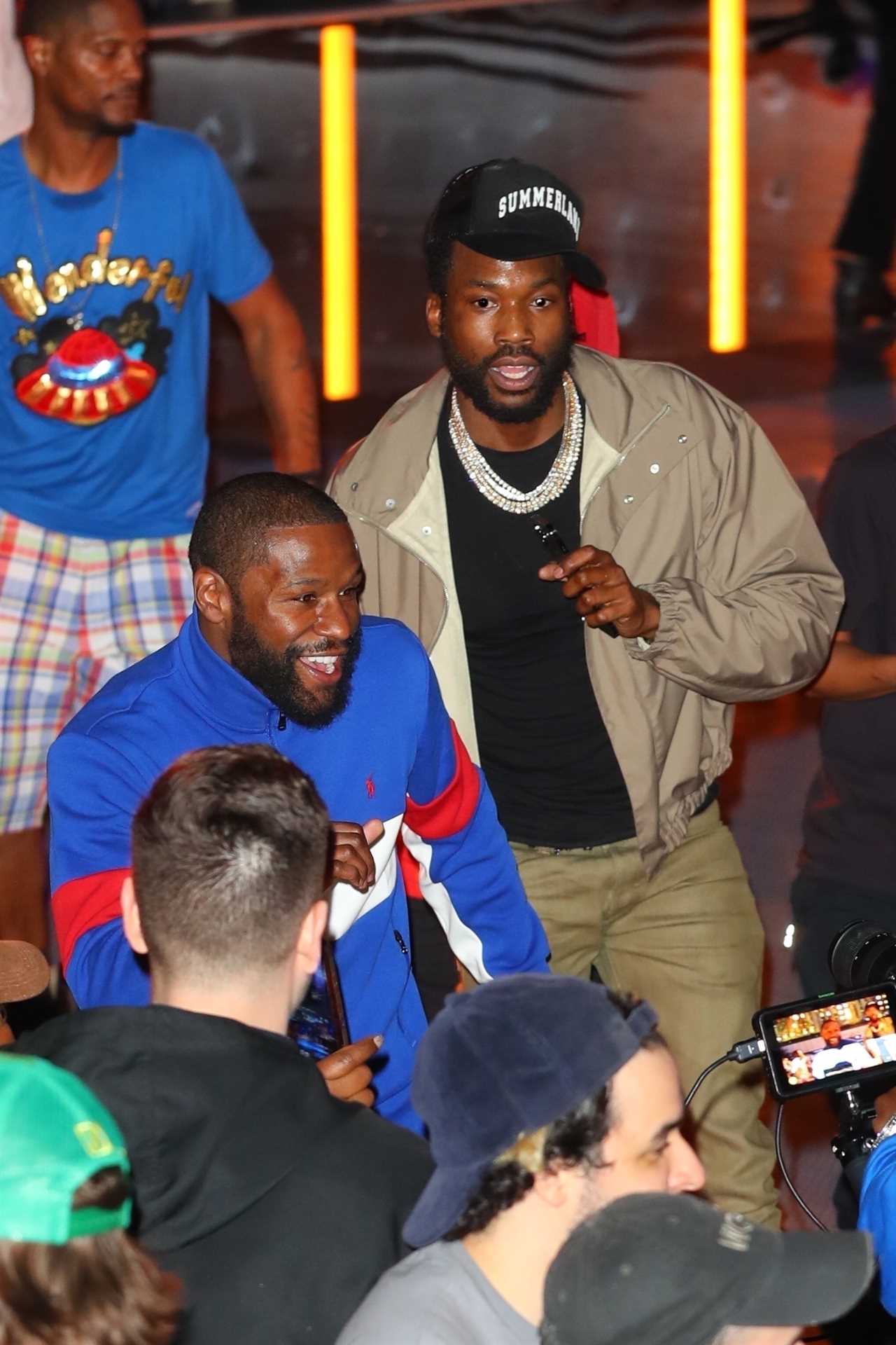 Floyd Mayweather joins Usher and Meek to rock out in New York's roller disco.