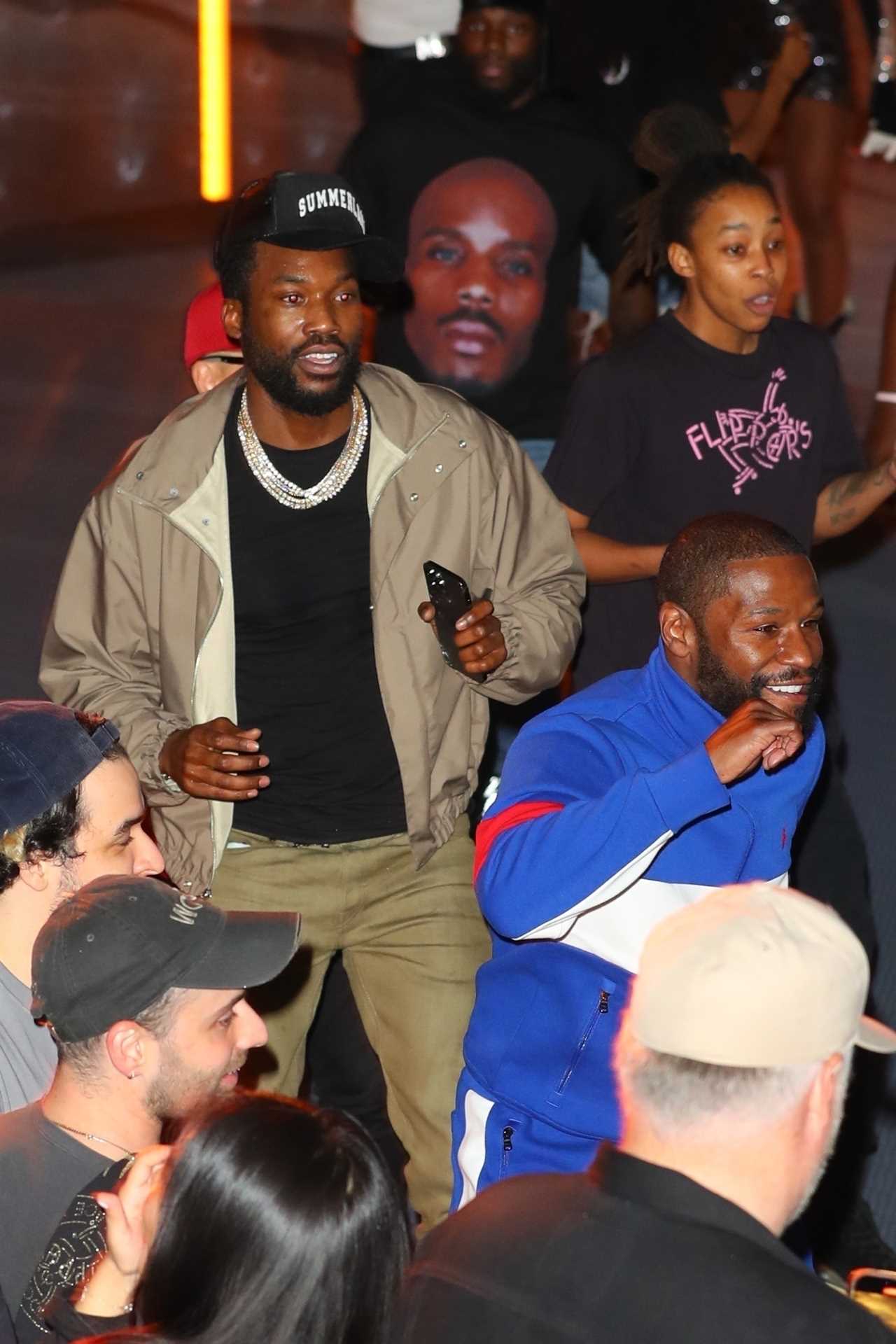 Floyd Mayweather joins Usher and Meek to rock out in New York's roller disco.