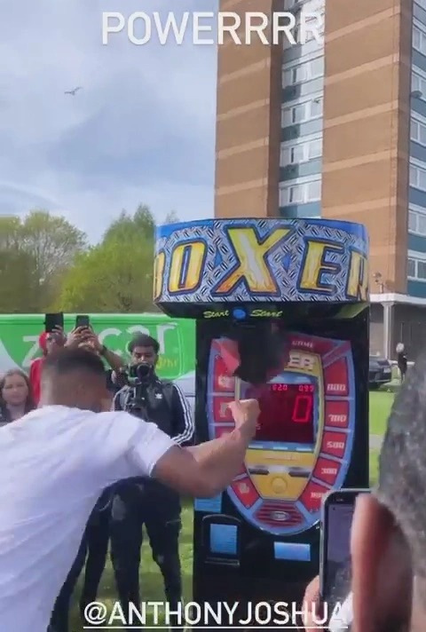 Watch Anthony Joshua's explosive punching power during an arcade boxing session at Easter Park Party in Watford
