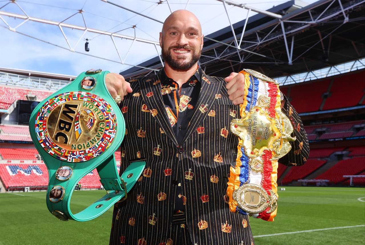 Tyson Fury wears a new custom suit to fight Dillian Whyte. It has a secret message and crowns.