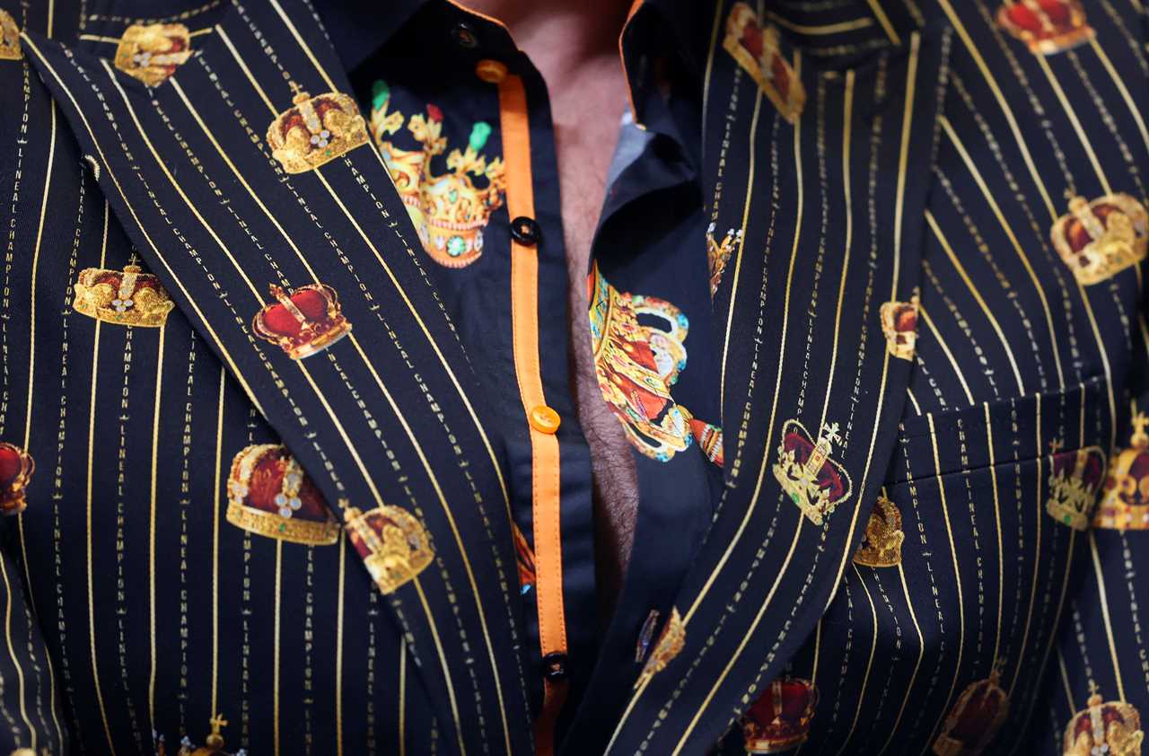 Tyson Fury wears a new custom suit to fight Dillian Whyte. It has a secret message and crowns.