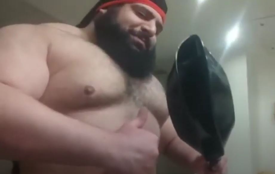 After Martyn Ford's fight is ended, watch Iranian Hulk CRUSH the frying pan in a frightening display of strength