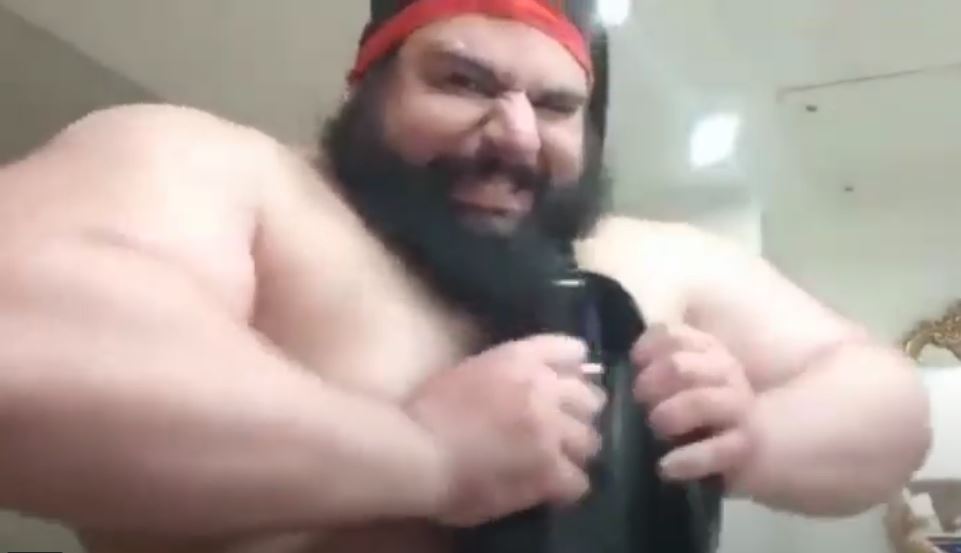 After Martyn Ford's fight is ended, watch Iranian Hulk CRUSH the frying pan in a frightening display of strength