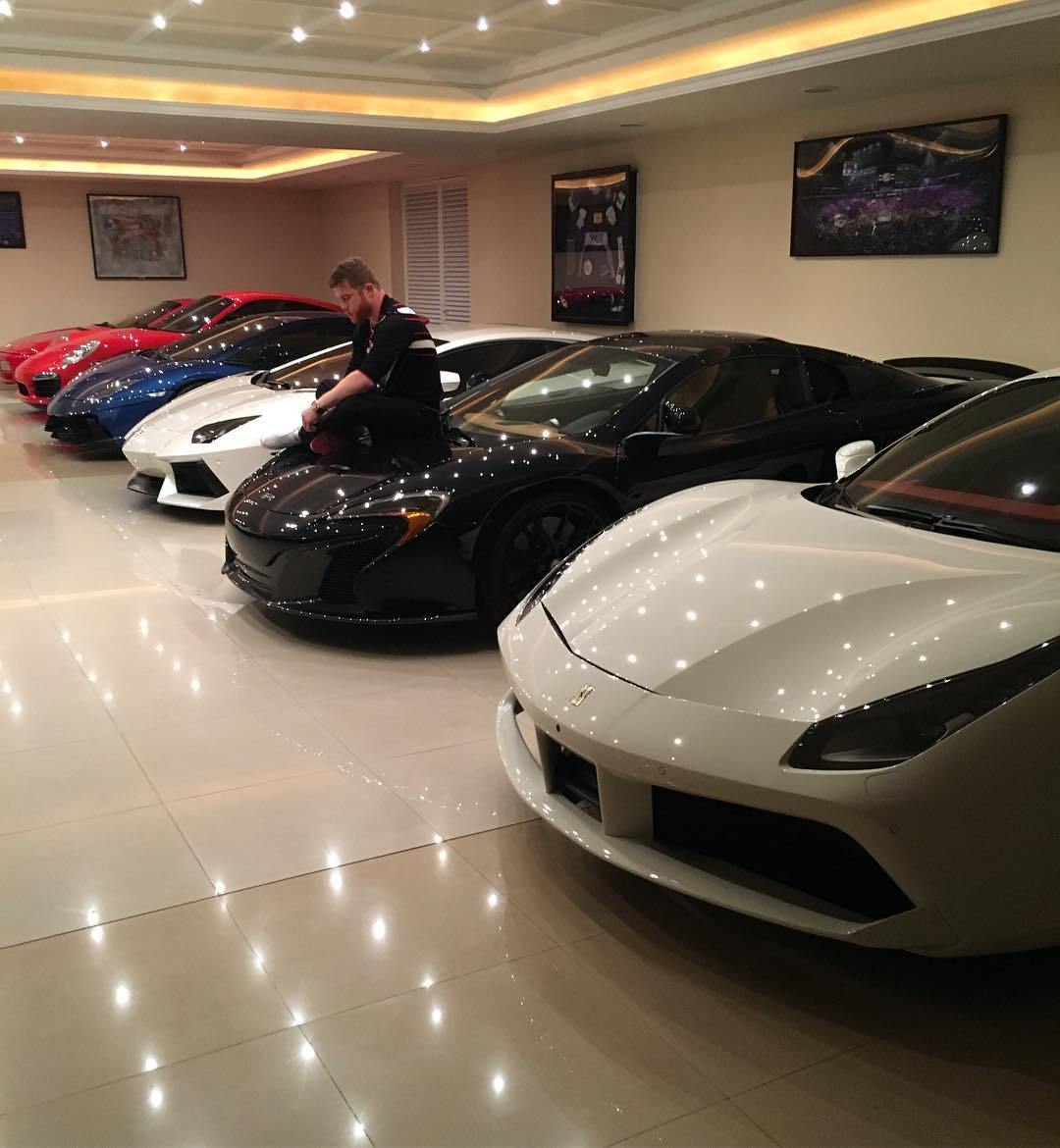 Canelo Alvarez has an insane collection of cars, including a blue Bugatti Chiron and a PS2m LaFerrari.