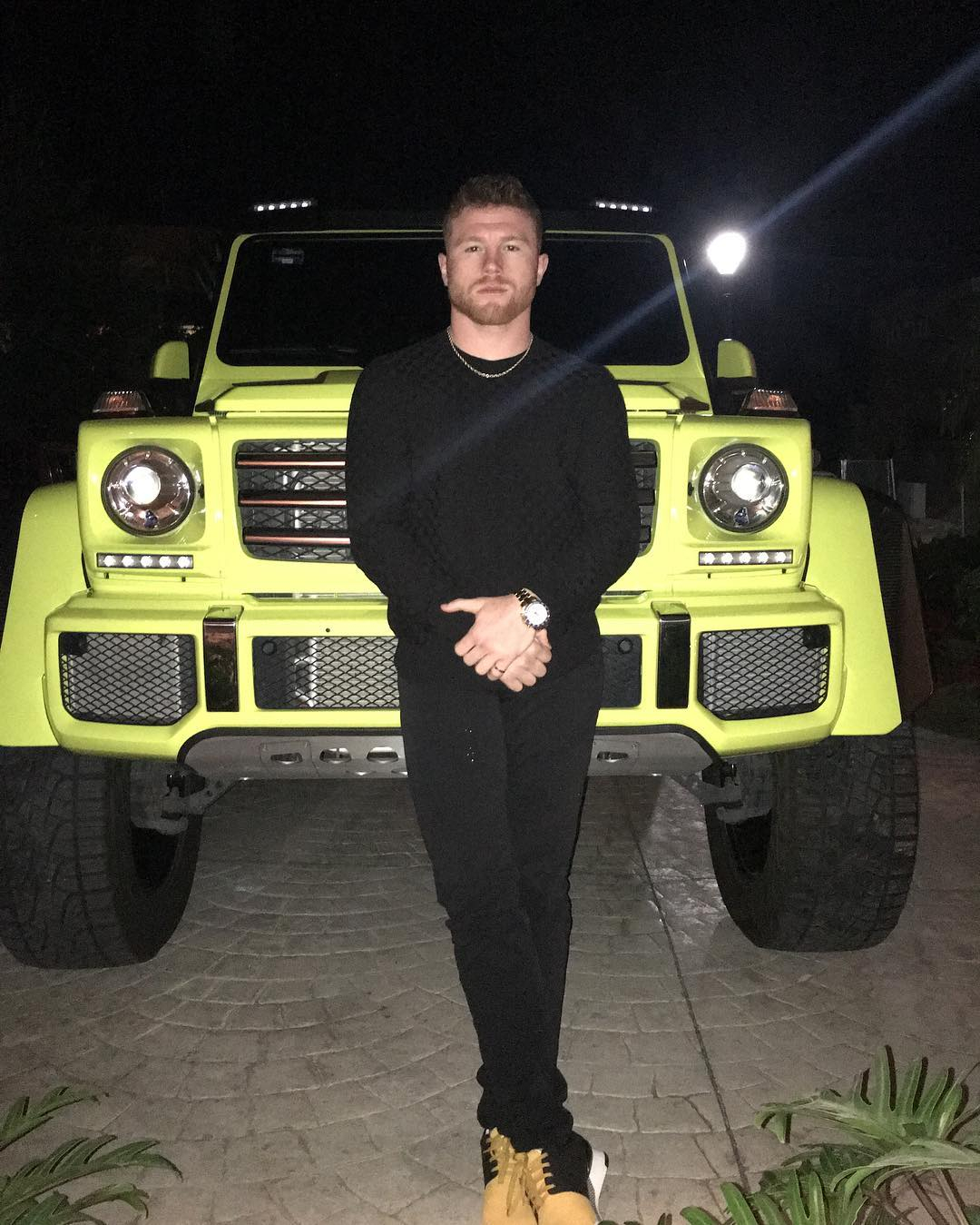 Canelo Alvarez has an insane collection of cars, including a blue Bugatti Chiron and a PS2m LaFerrari.