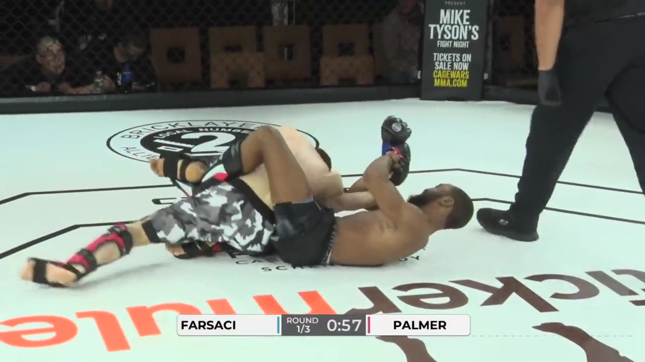 Farsaci, a MMA fighter, has his shoulder ripped out of socket. He writhes in pain after refusing tap out.