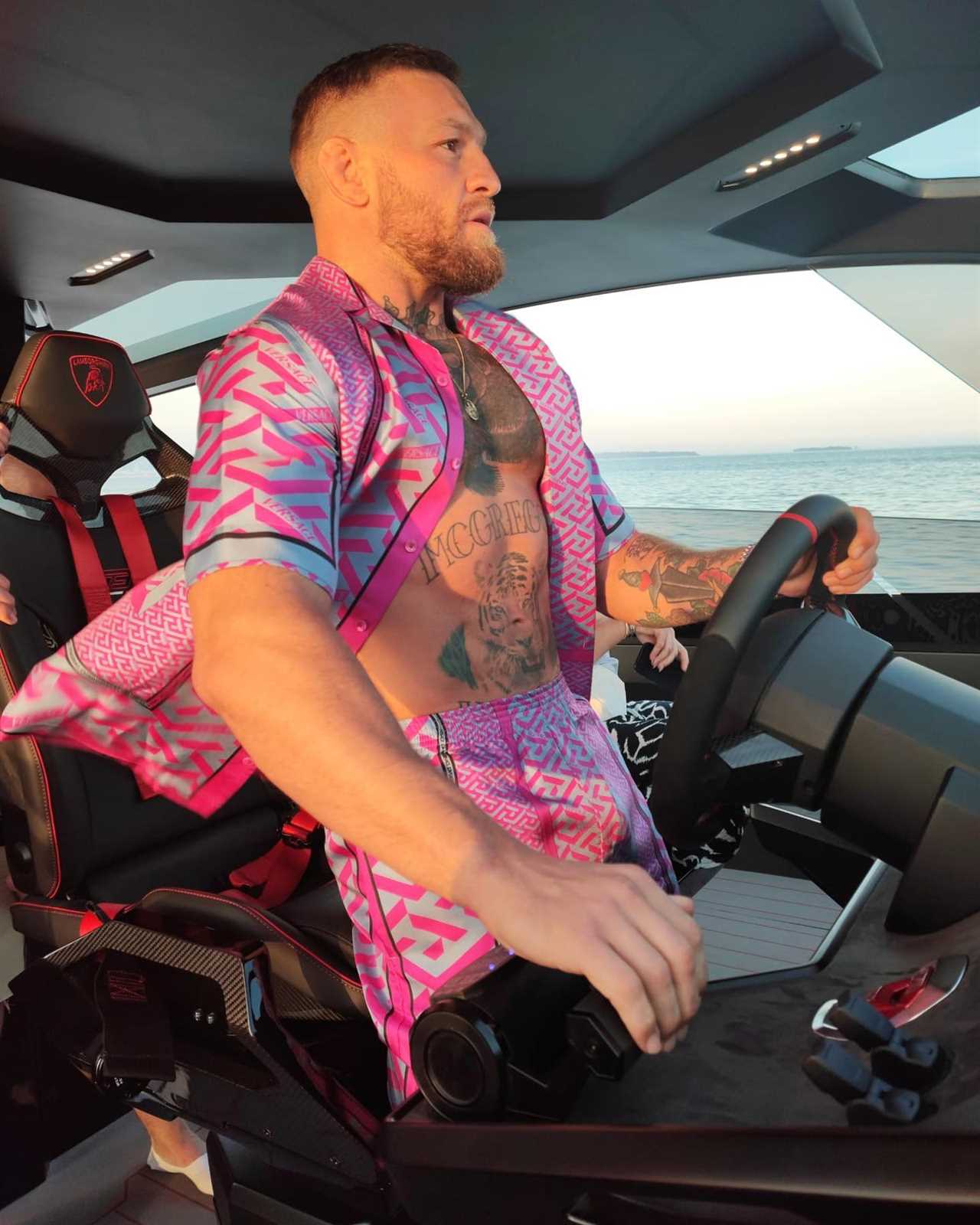 UFC star Conor McGregor enjoys his Proper 12 whiskey after sailing new custom £2.4m Lamborghini yacht while on holiday