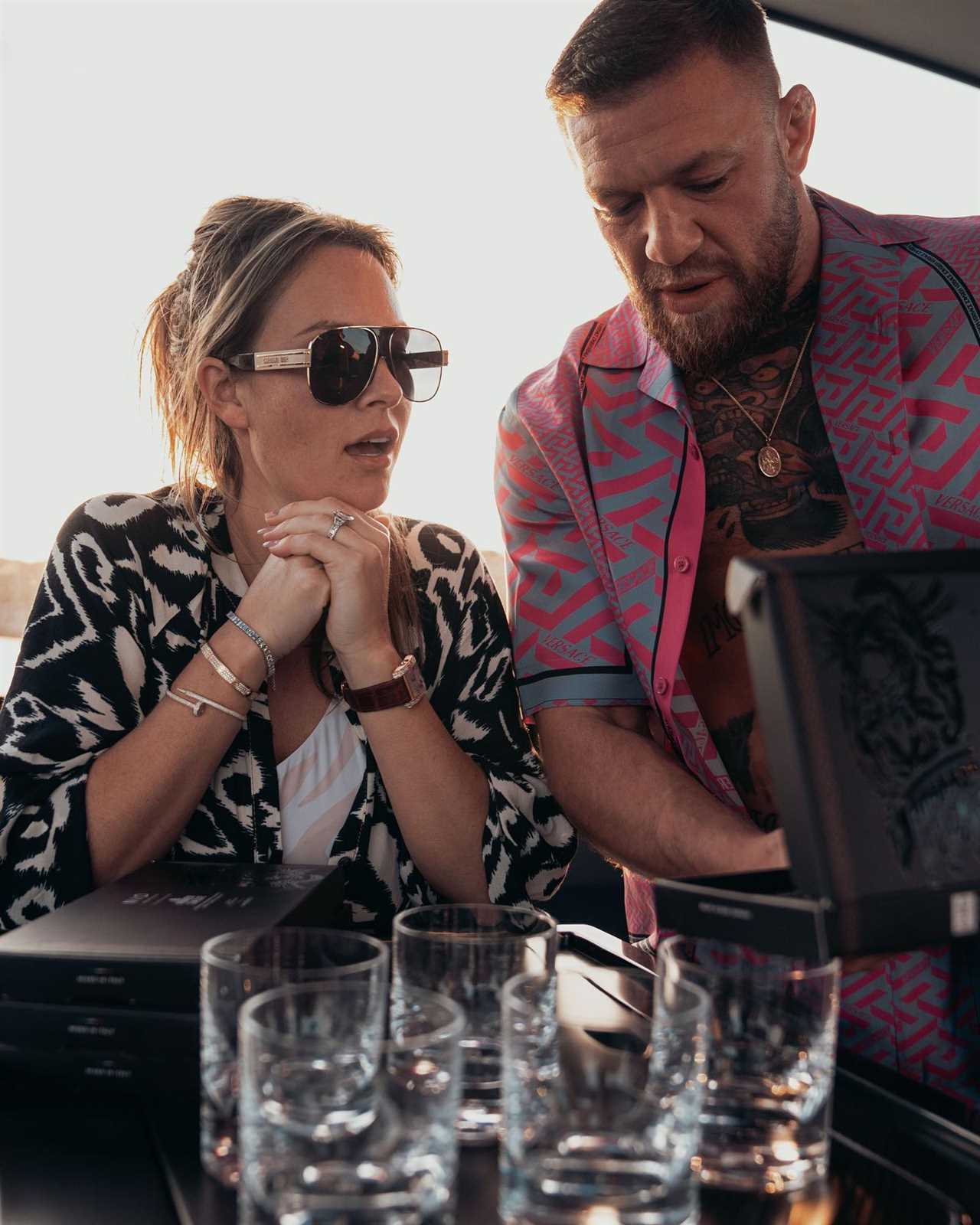UFC star Conor McGregor enjoys his Proper 12 whiskey after sailing new custom £2.4m Lamborghini yacht while on holiday