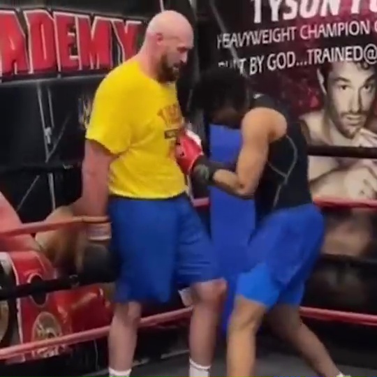 Watch Tyson Fury spar youngsters at old amateur gym as Gypsy King struggles to stay away from ring after retirement