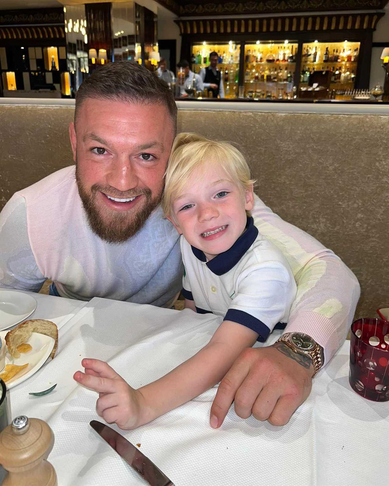 Conor McGregor and Dee Devlin bring their son Conor Jr. out for Conor Jr's 5th Birthday and celebrate with Spider-Man cake
