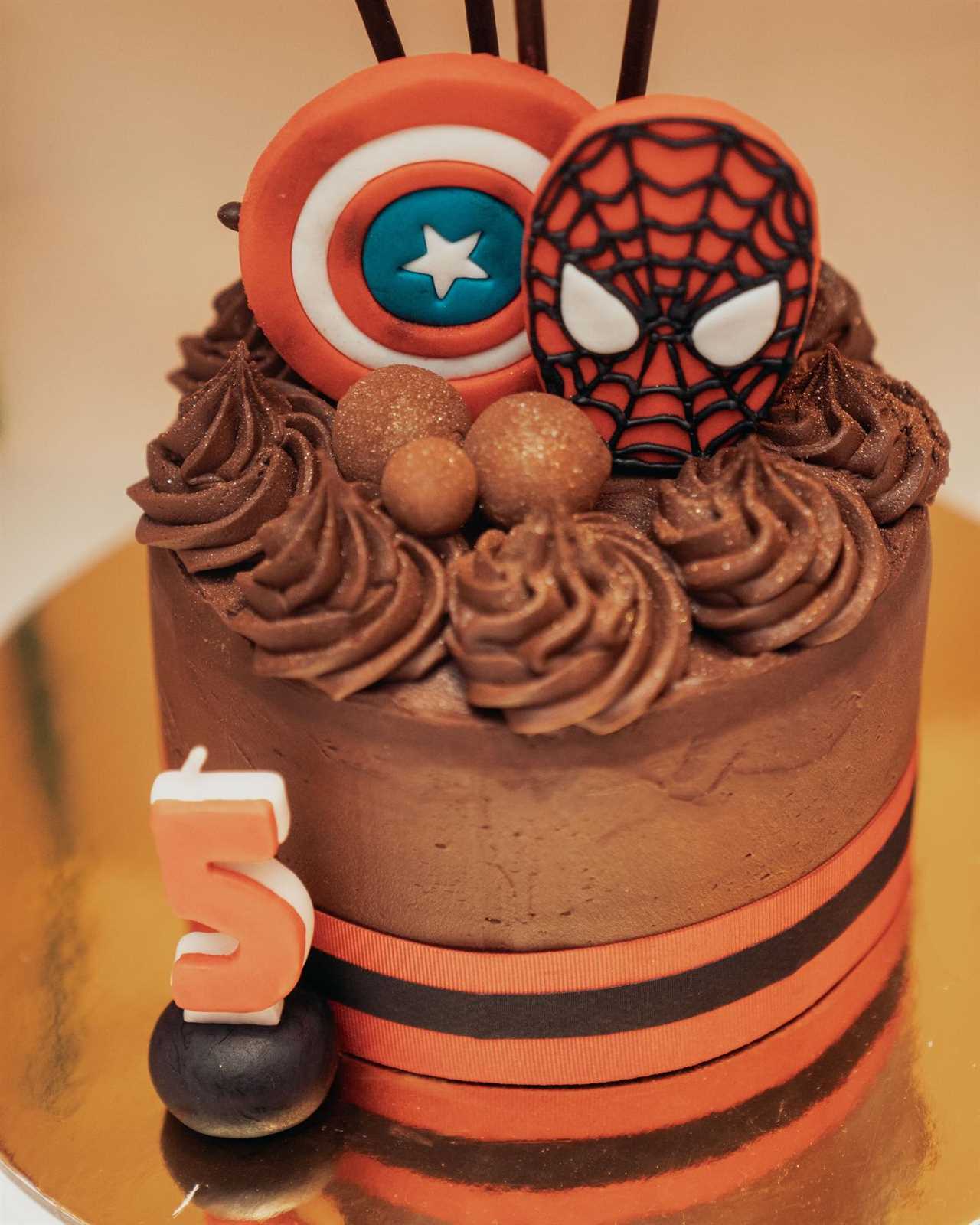 Conor McGregor and Dee Devlin bring their son Conor Jr. out for Conor Jr's 5th Birthday and celebrate with Spider-Man cake