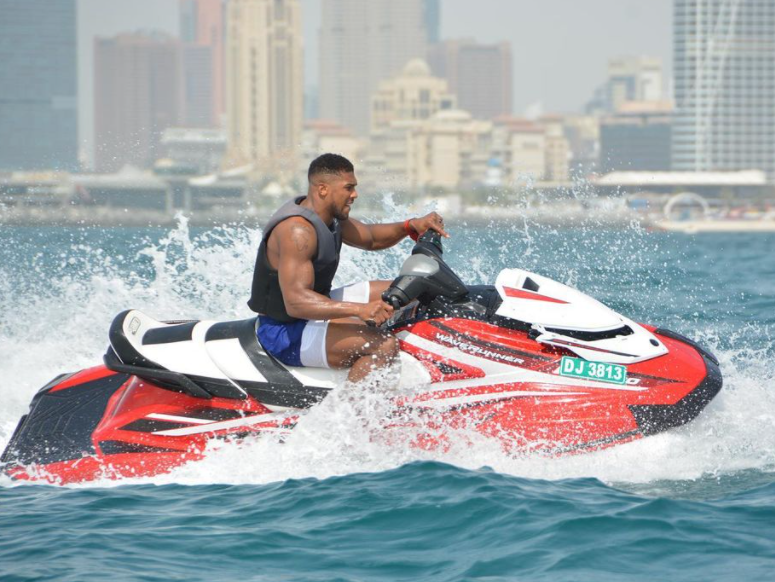 Anthony Joshua jet-skis and shows off a huge body in Dubai, ahead of Oleksandr Uzyk's rematch