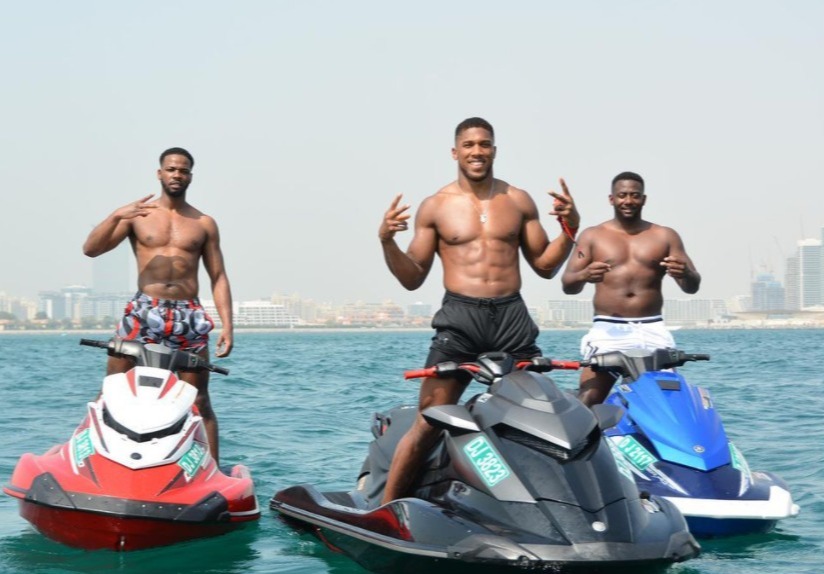 Anthony Joshua jet-skis and shows off a huge body in Dubai, ahead of Oleksandr Uzyk's rematch