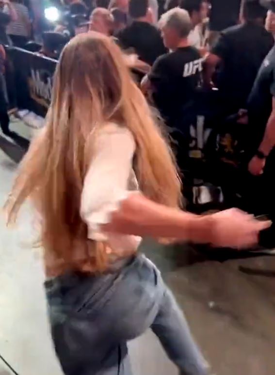 Watch female fan brutally sent flying by ruthless security guard during failed attempt to break into octagon at UFC 274