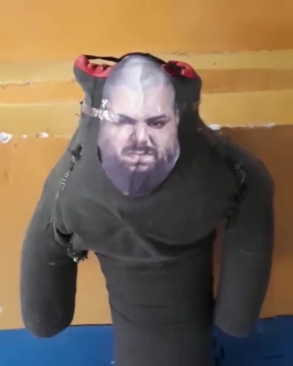Kazakh Titan calls Iranian Hulk out for attacking punchbag with his face in bizarre video