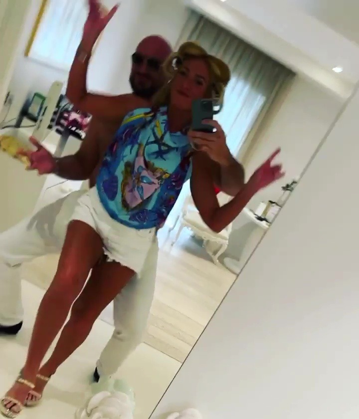 Tyson Fury and Paris dance topless ahead of a night out as the heavyweight champion continues to enjoy retirement