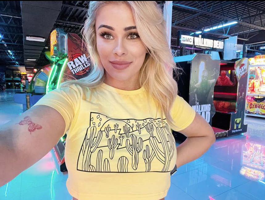Paige VanZant looks stunning in a yellow crop-top, mocking Austin Vanderford, MMA partner.