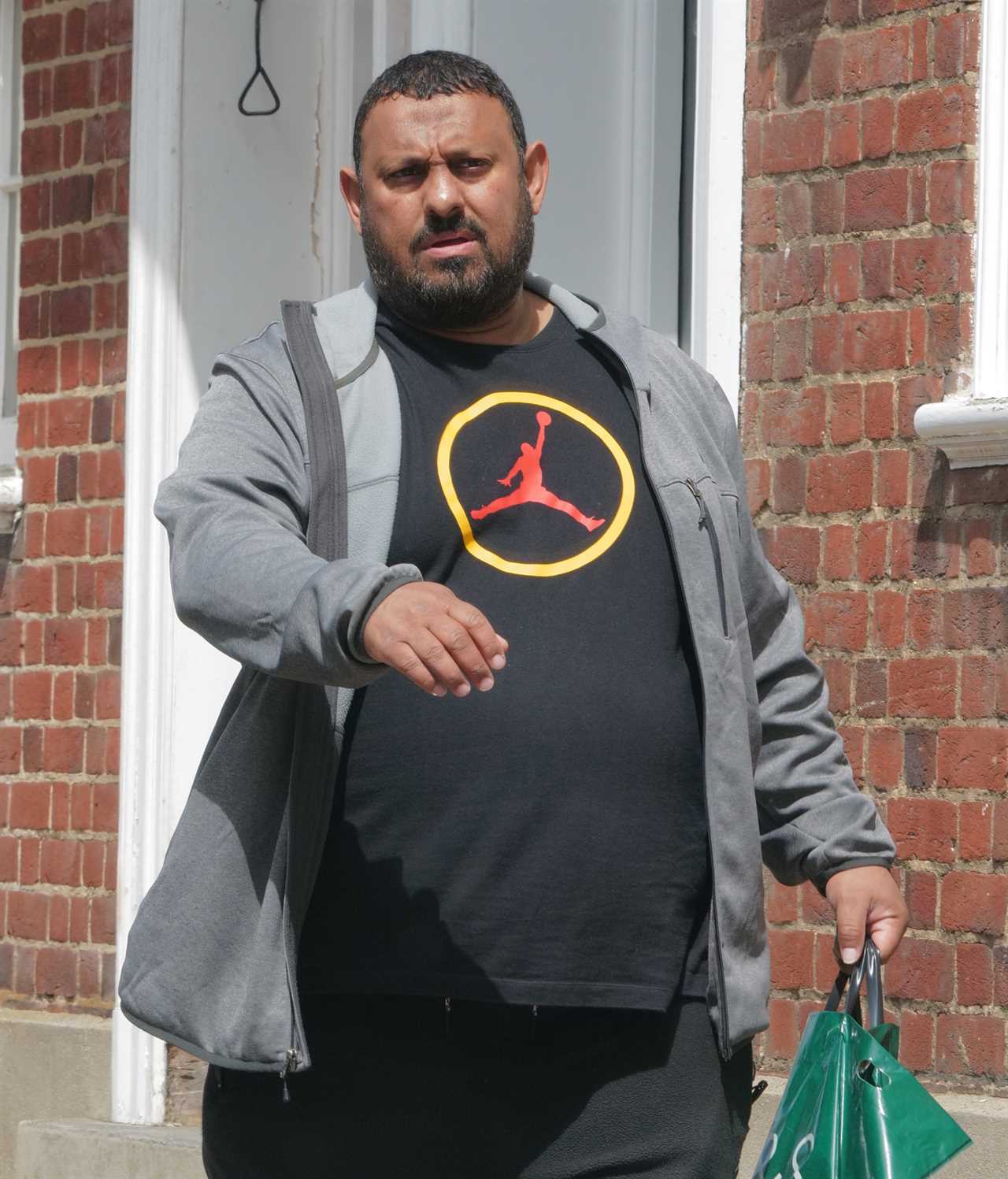 Prince Naseem Hamed, who rents a PS1.4m house near the Queen, is pictured strolling around Windsor Castle