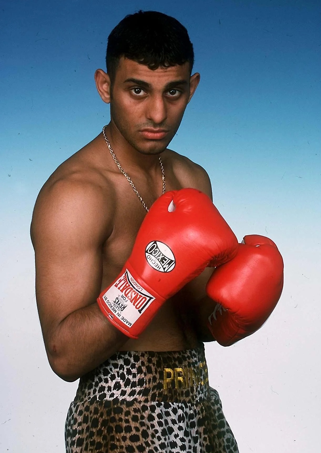 Prince Naseem Hamed, who rents a PS1.4m house near the Queen, is pictured strolling around Windsor Castle