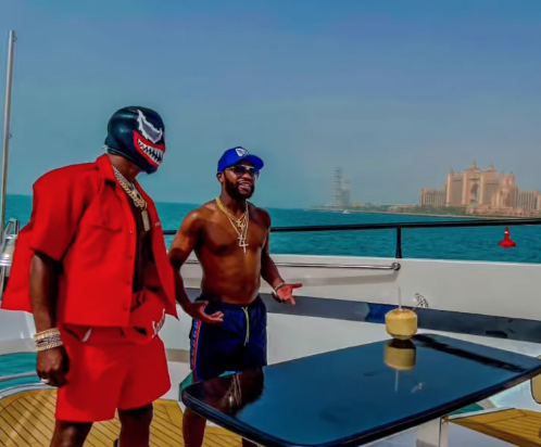Floyd Mayeather's luxurious Dubai trip, which includes yacht parties and indoor snowboarding, is featured in this article.