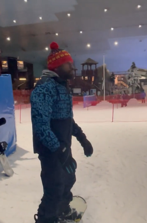 Floyd Mayeather's luxurious Dubai trip, which includes yacht parties and indoor snowboarding, is featured in this article.
