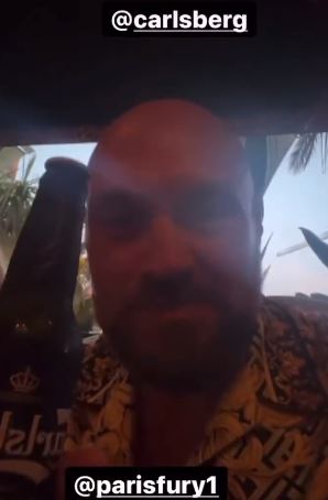 Tyson Fury is enjoying his retirement on vacation as he refuses the temptation to lift a finger while Paris works and passes him beers
