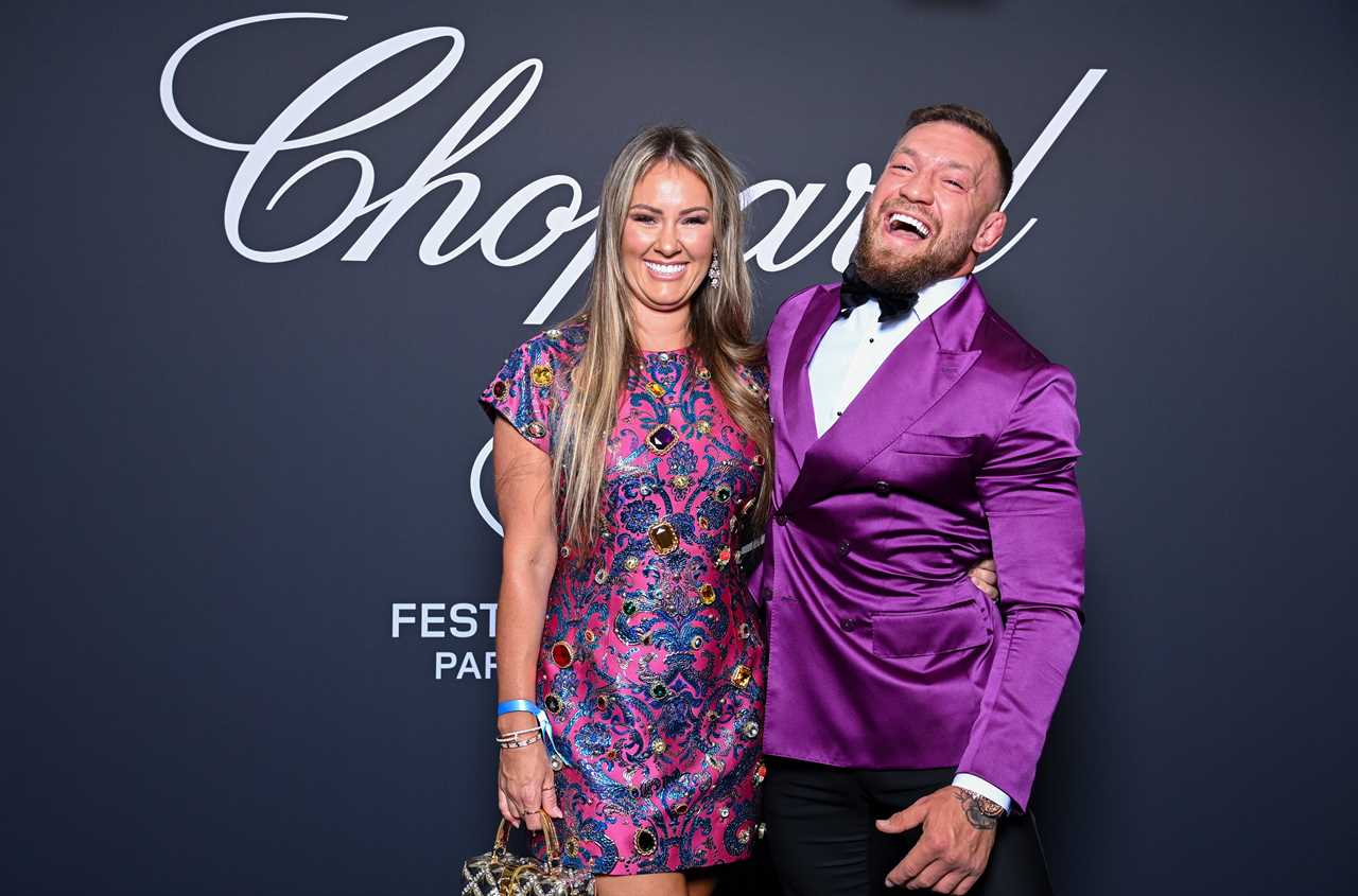Conor McGregor, UFC star, looks enormous in a daring purple satin costume as he heads to Cannes Film Festival with Dee