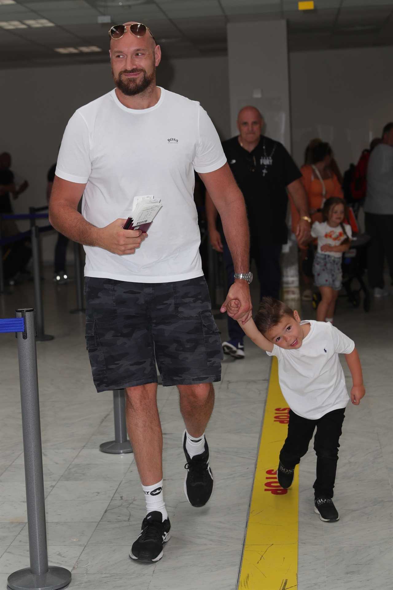 Paris and Tyson Fury swap high-life PS18k-anight yachts for a budget flight to Manchester after a luxury Cannes trip