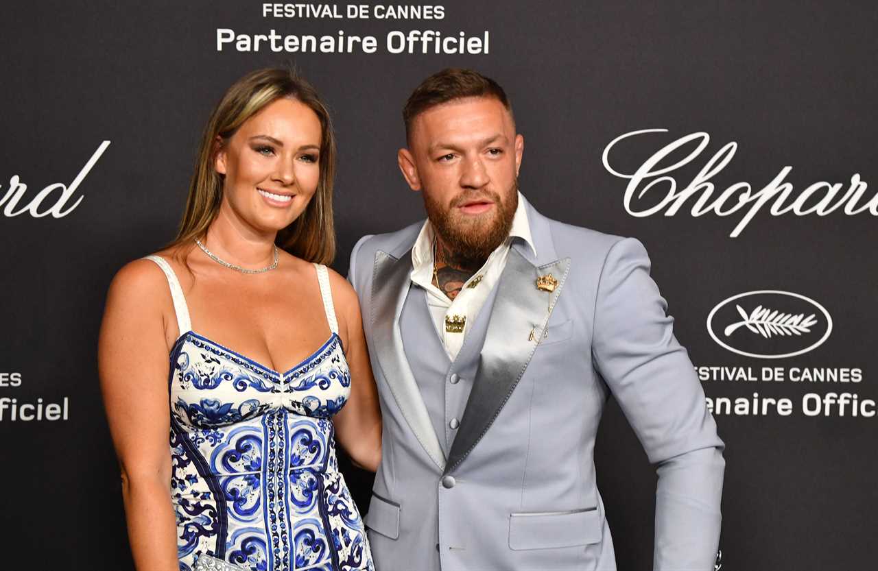 Conor McGregor and Dee Devlin kiss on the red carpet. UFC star and fiancee, Dee Devlin, are dressed up for Choprad Cannes Gala Dinner