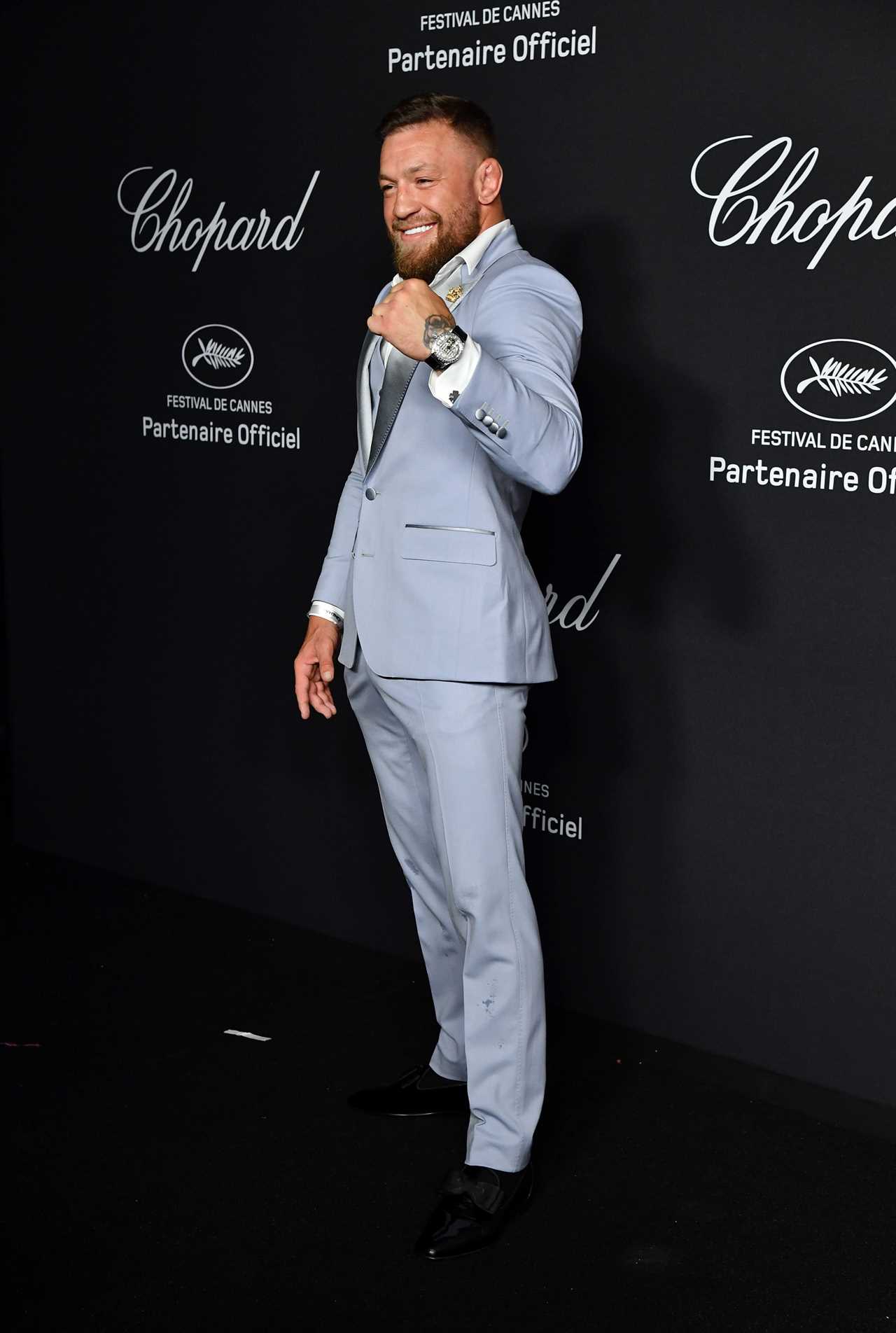 Conor McGregor and Dee Devlin kiss on the red carpet. UFC star and fiancee, Dee Devlin, are dressed up for Choprad Cannes Gala Dinner
