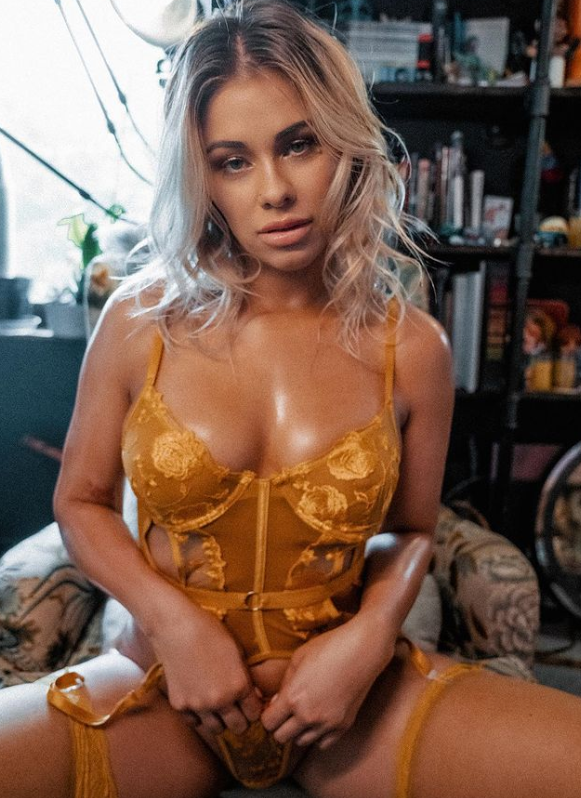 Paige VanZant, a former UFC star, teases her fans with busty lingerie photos as she reveals her new tattoos